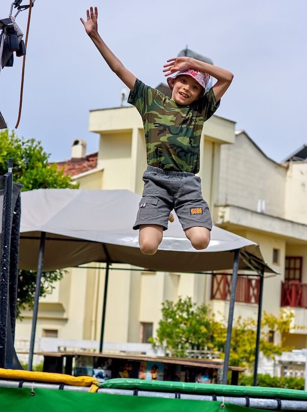 A child jumps on a rental inflatable